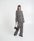 Pantaloni a gamba larga in animalier 'Naima' #nero